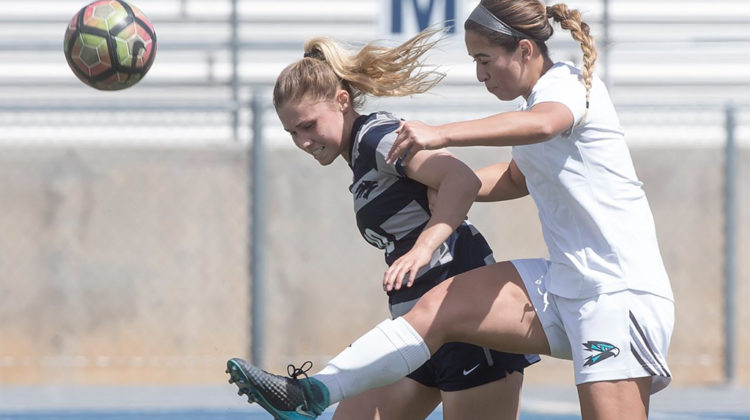 Eleanor Small fights for the ball