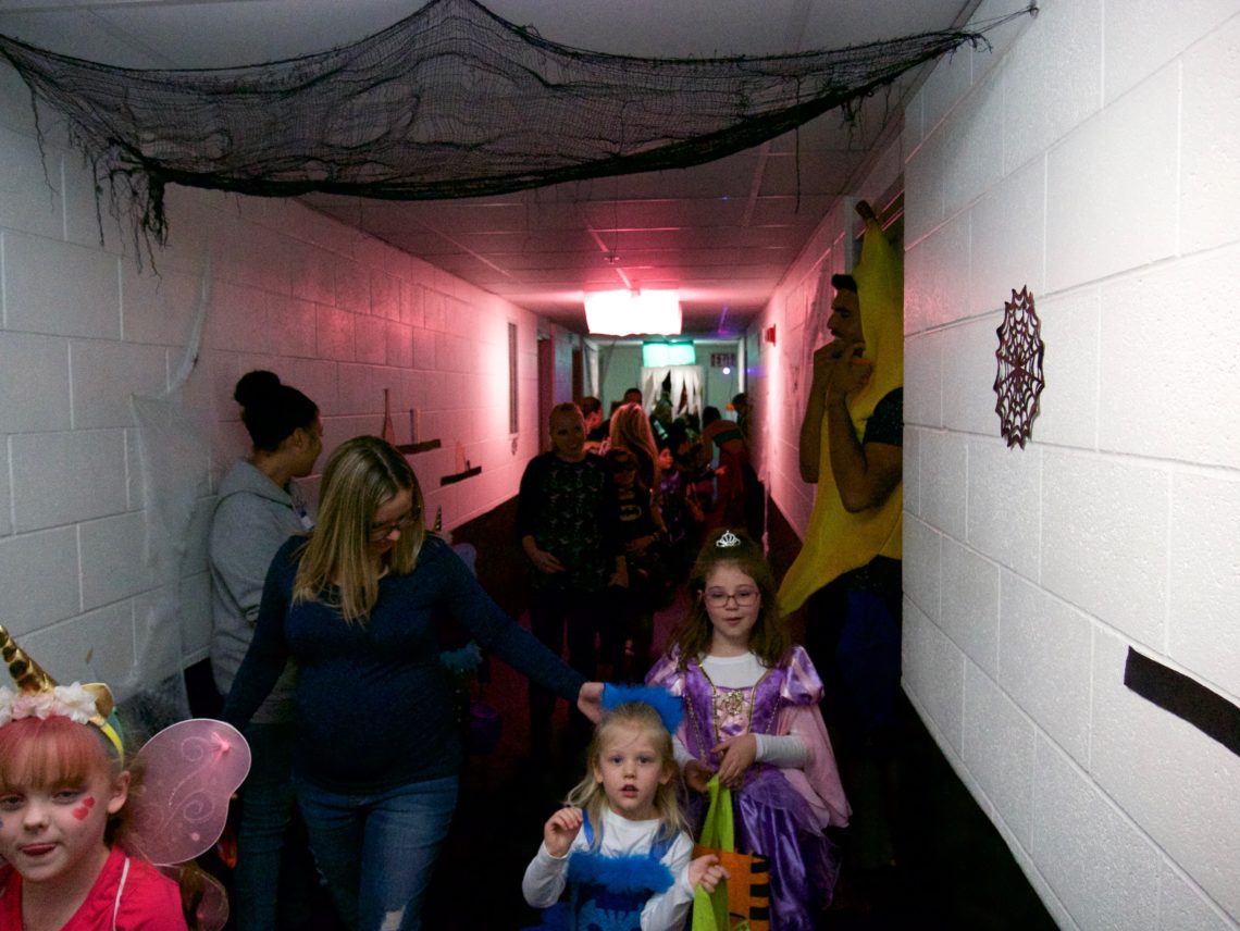 kids-and-adults-during-safe-trick-or-treat-in-canada-hall