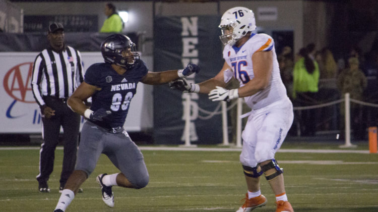 Korey Rush engages lineman