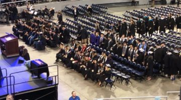 University of Nevada, Reno graduates sit in Lawlor Events Center before their winter commencement on Dec. 8, 2019.