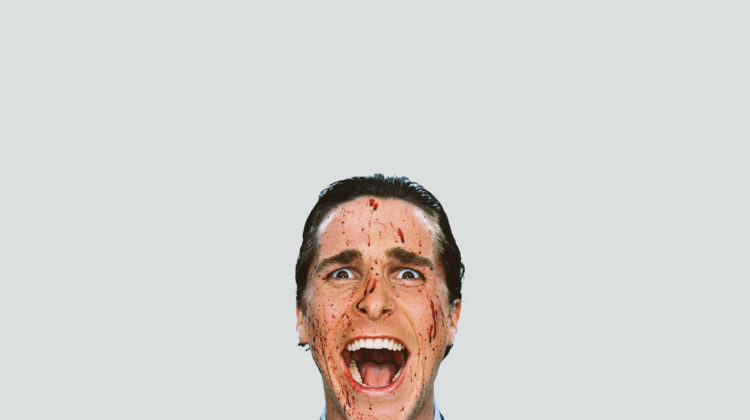 christian-bale-covered-in-blood-screaming-and-looking-at-the-camera