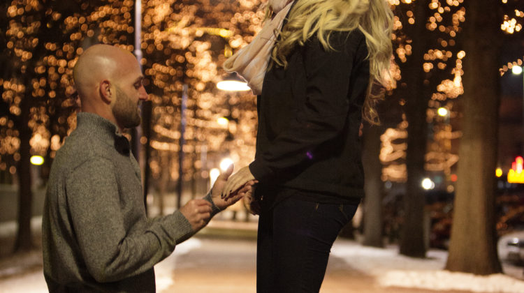 Man proposals to his girlfriend.
