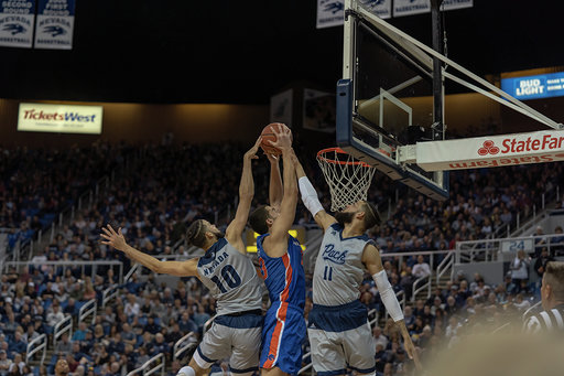 Caleb Martin and Cody Martin both go up to block a Boise State player