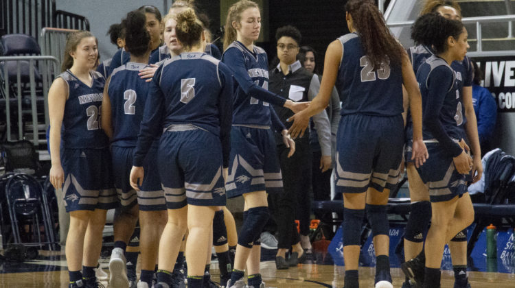Nevada Women's Basketball huddles after a loss.