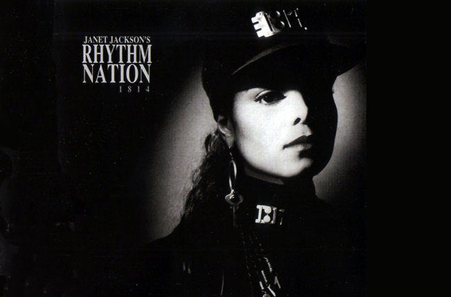 Woman pictured with a black baseball cap, a hoop earring with a key and military jacket with badge that says "1814." On the left side, there's text that says "Janet Jackson's Rhythm Nation 1814." The photo is in black and white.