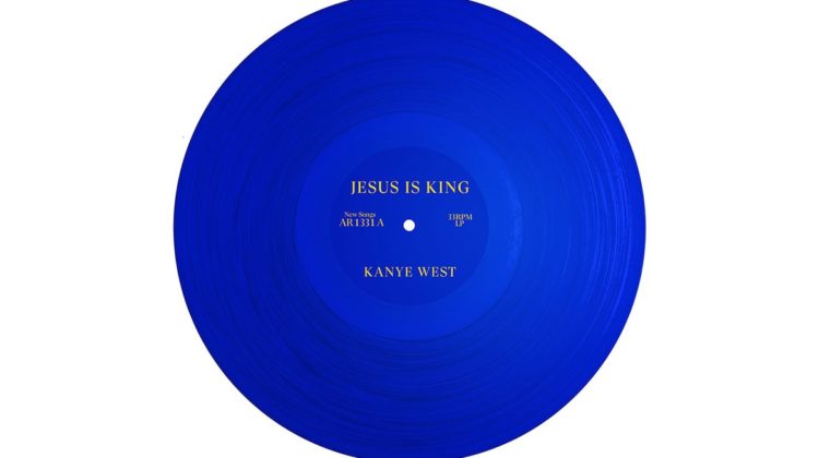 Album cover for Kanye West's "Jesus Is King." The cover shows a blue vinyl record that says "Kanye West Jesus Is King" in front of a white background.