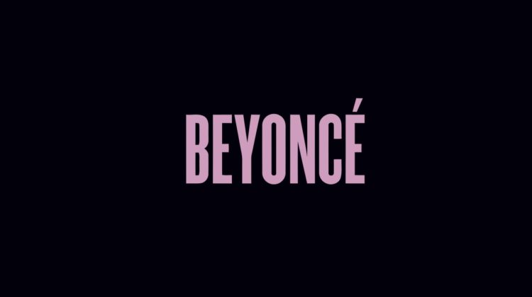 A black background with the name "Beyoncé" in big, pink letters.