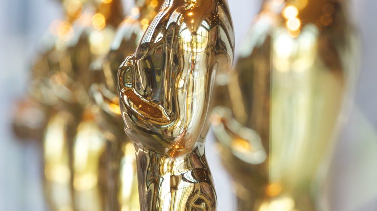 A row of trophies from the Oscars.