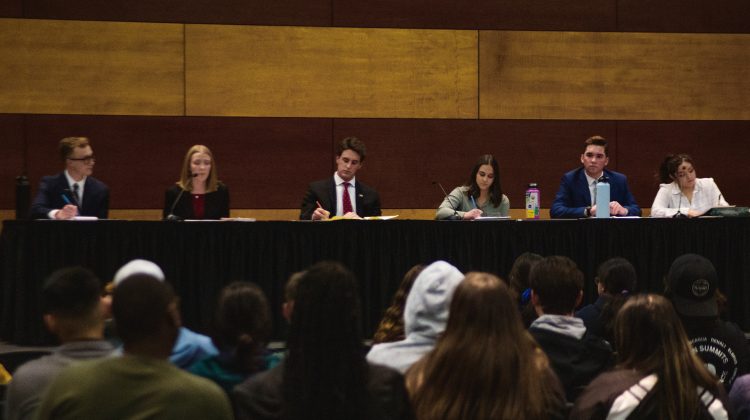 Senate candidates from left to right Connor Doyle, Lauren Harvey, Kenneth Heinlein, Victoria Supple, Zane Taylor and Kate Torres debate at the Joe Crowley Student Union on Thursday, Feb. 20.