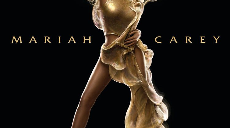 Mariah Carey, in a gold dress and flowing blonde hair, strikes a fierce pose with her hand over her head. "Mariah" is written on the left side and "Carey" is written on the left side.