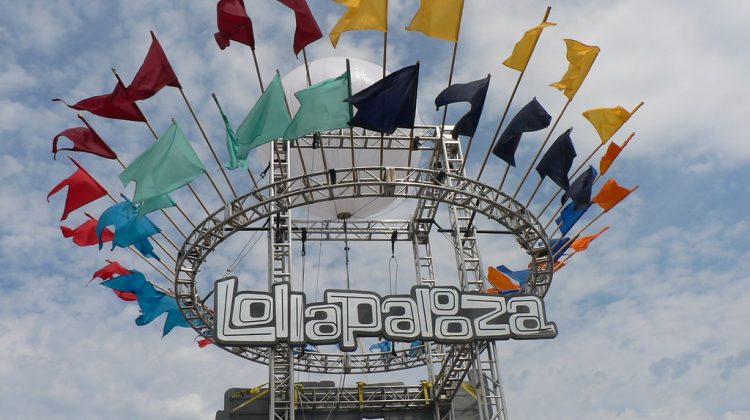Lollapalooza sign with colorful flags in Chicago.