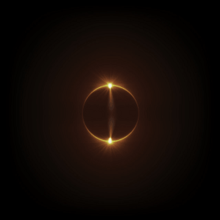 Black background with an eclipse of a black circle with a glowing background through the middle and around the back of the circular planet.