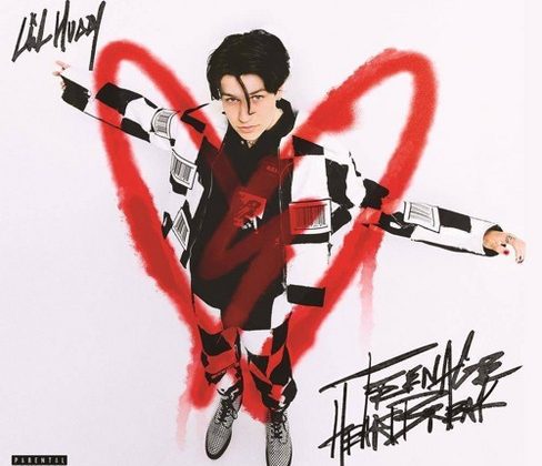 Lil Huddy under a drawn hear wearing black and white clothing against a white background. His signature and "Teenage Heartbreak" writing in the top left and bottom right corner. In the left corner it gives the album rating.